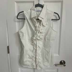 Haleigh’s NWT white sleeveless blouse with front ruffles size 44